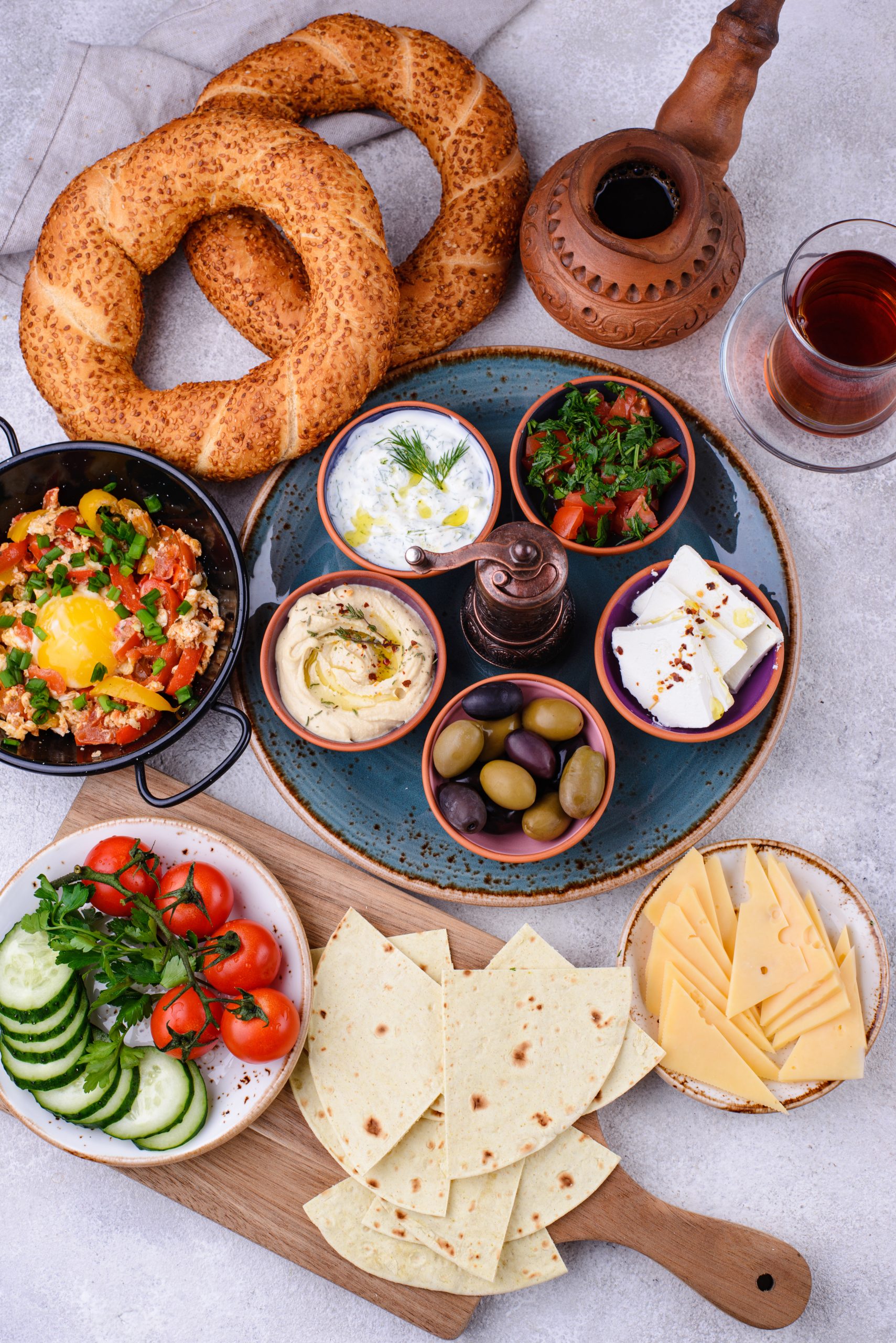 Traditional Turkish breakfast with meze and simit